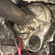 You can see some of my expertly painted flywheel timing marks in yellow through the starter motor hole. :p